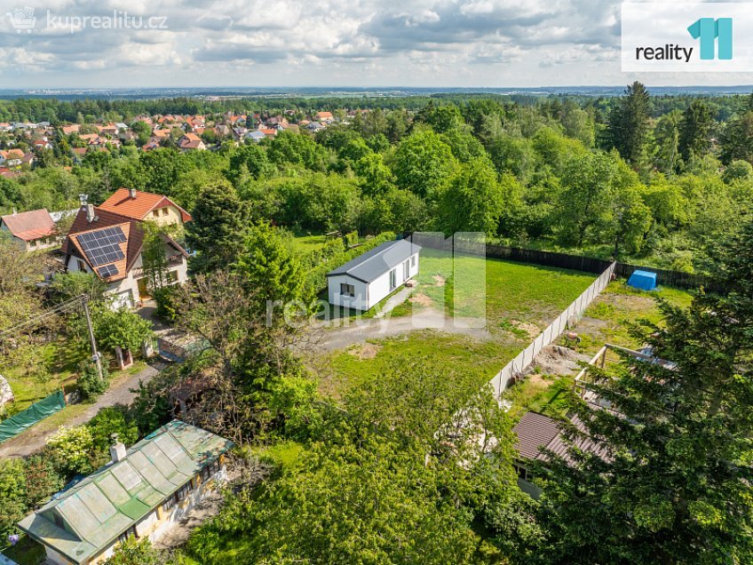 Prodej  stavebního pozemku 1001 m^2 Vysoká, Psáry 