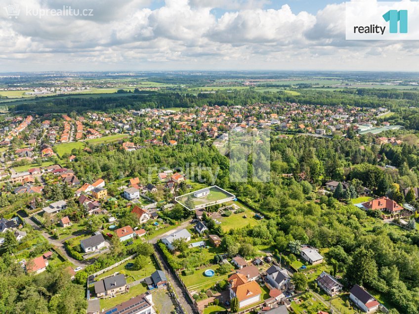 Prodej  stavebního pozemku 1001 m^2 Vysoká, Psáry 