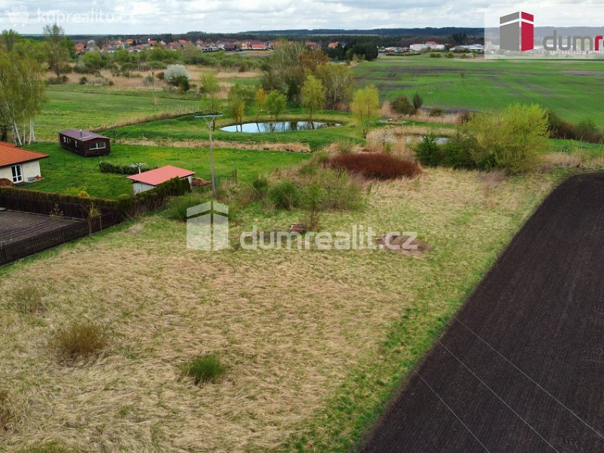 Prodej  stavebního pozemku 839 m^2 K Potoku, Dřísy 